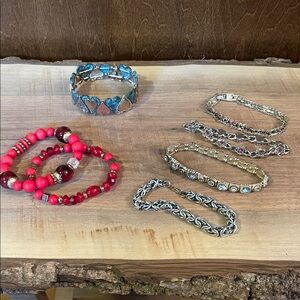 Red and blue miscellaneous bracelet set.
